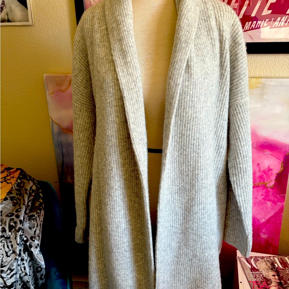 Silvery grey warm sweater. Small size fits like a medium